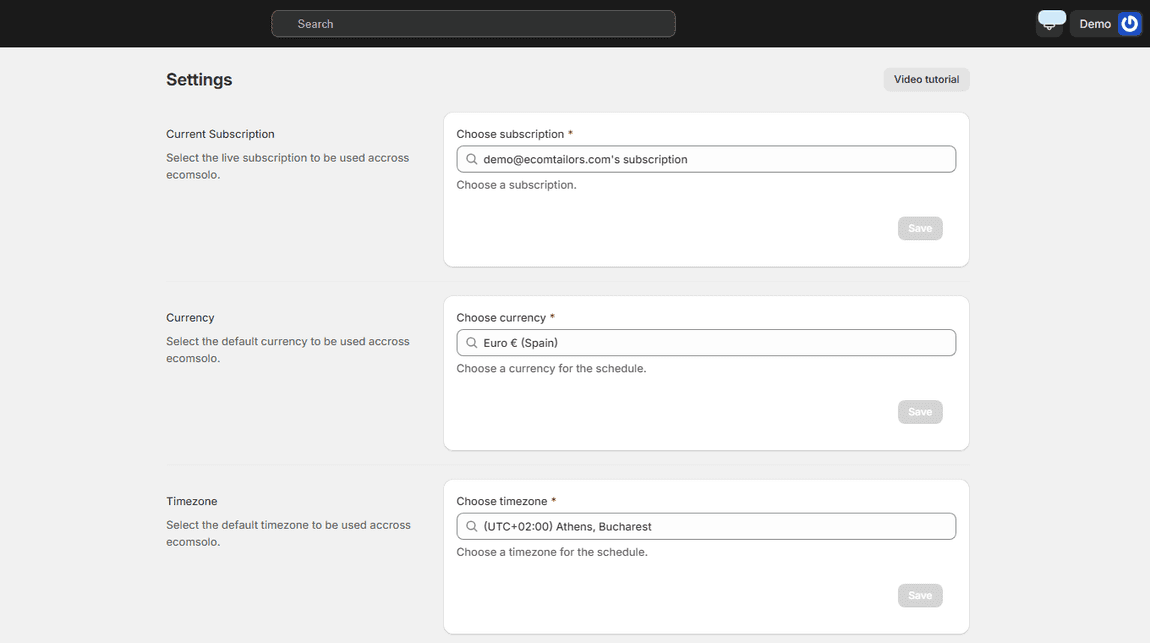 Settings page with the default currency and timezone selectors that apply across all stores